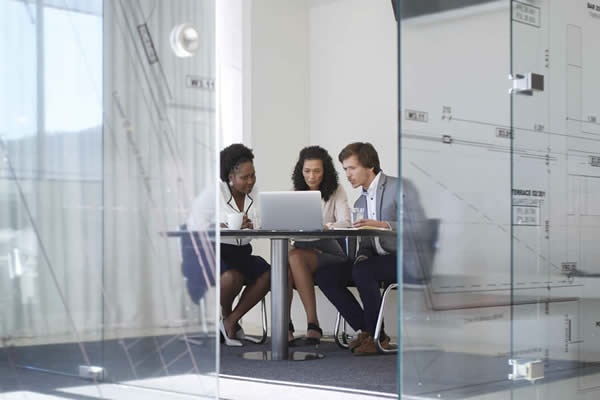 people sitting around small table